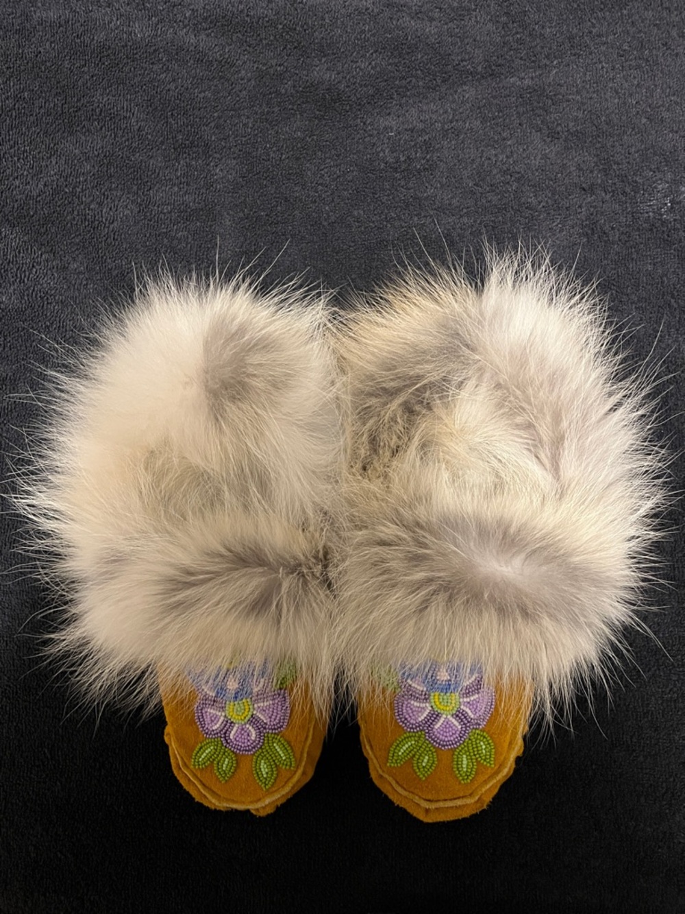 Brand new, never worn. Beaded Floral Moccasin Slippers with soft Coyote Fur Trim